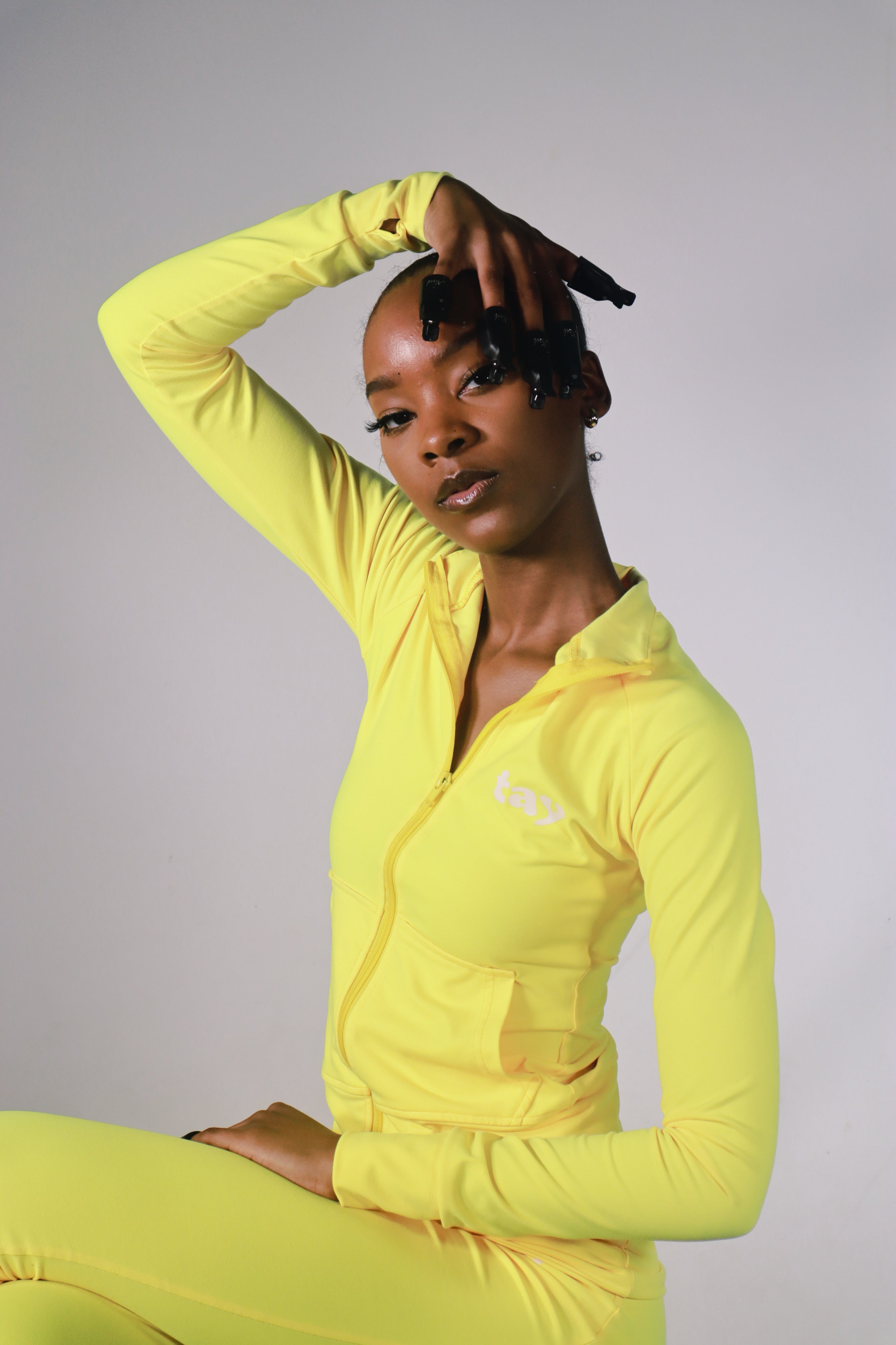 yellow zip up jacket